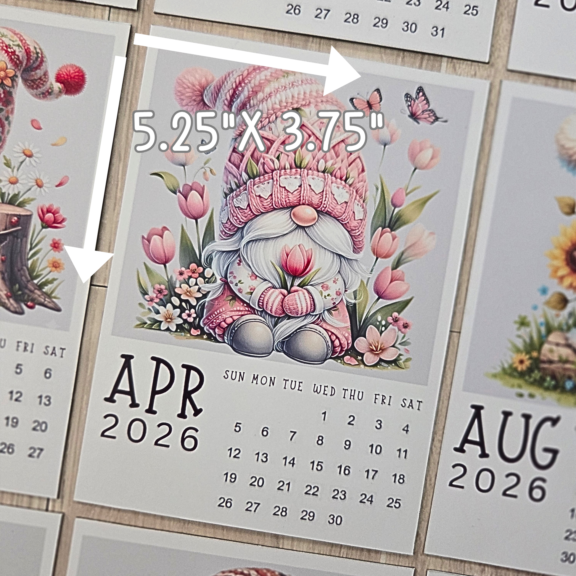 Calendar with a gnome illustration and floral design, showing April 2026.