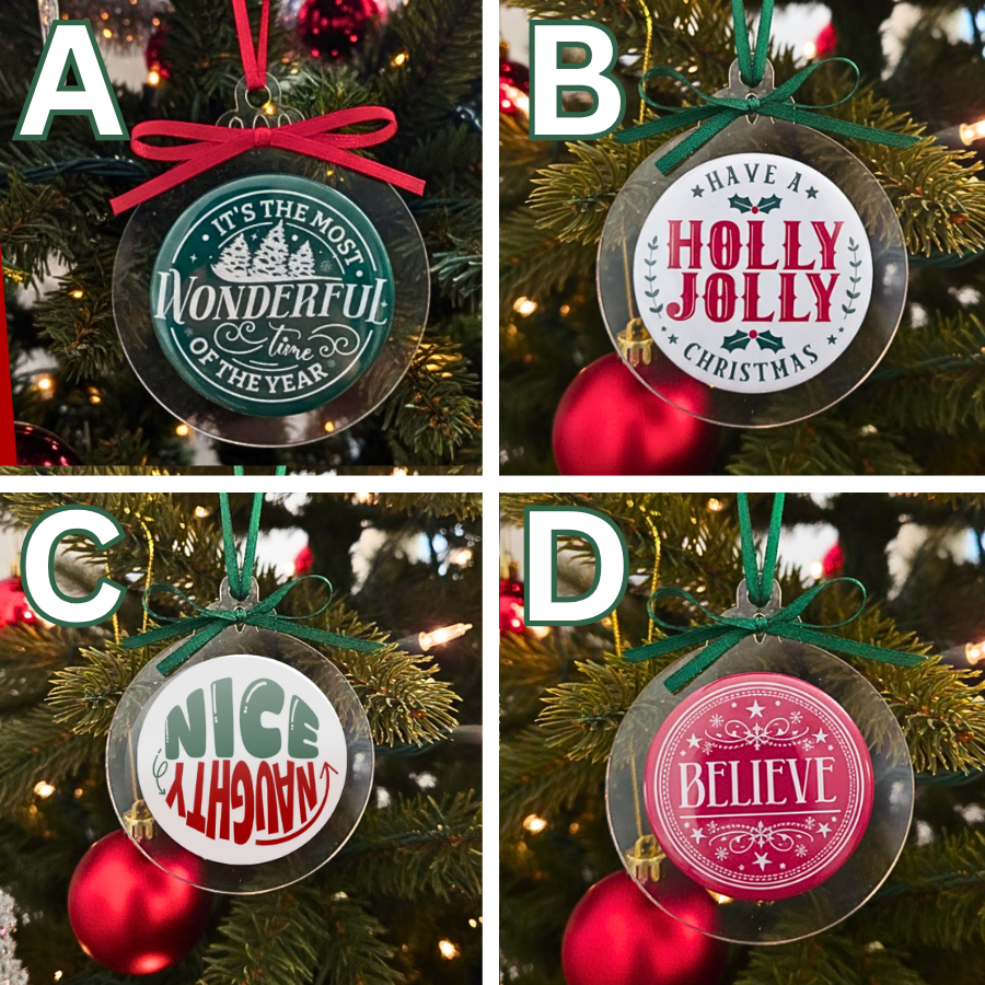 Four magnetic Christmas tree ornaments with different festive messages.