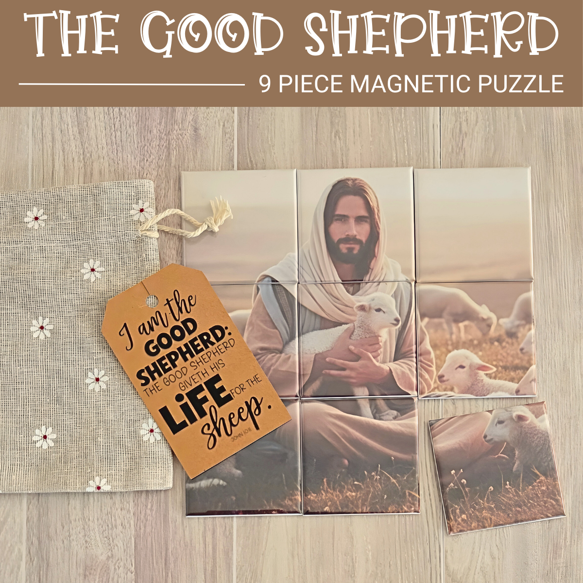 Magnet Puzzle of a Jesus Christ holding a lamb with sheep in the background on a wooden surface. It the Lamb of God puzzle for the Easter season.  show a tag that quotes the Scripture John 10:1 I am the Good Shepherd. The Good Shepherd giveth his life for the sheep.