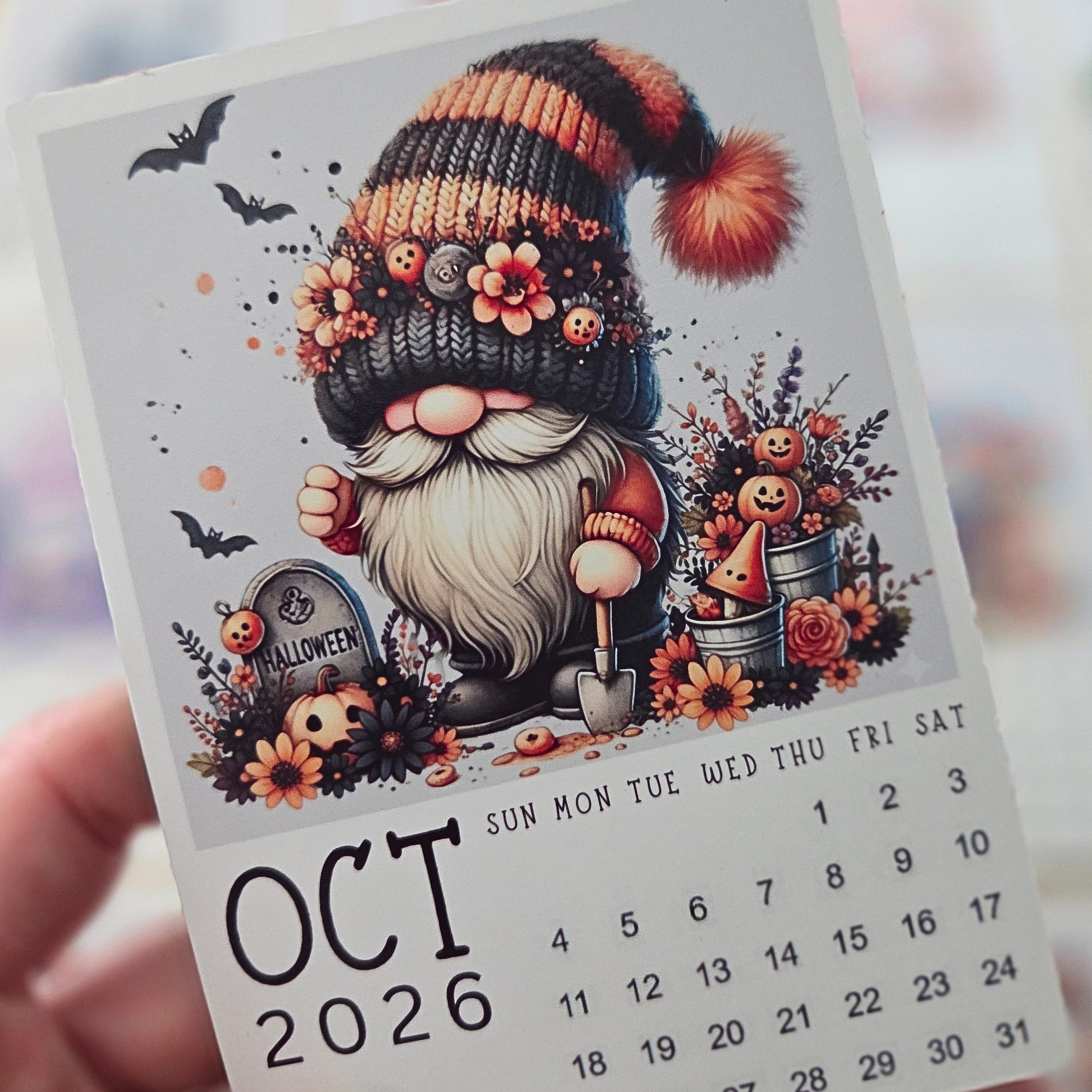 Calendar for October 2026 with a gnome illustration and Halloween-themed design.