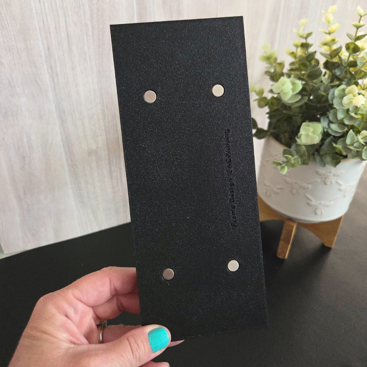 Black 1×3 photo magnet frame with a modern beaded edge, shown empty to highlight the three‑slot layout.