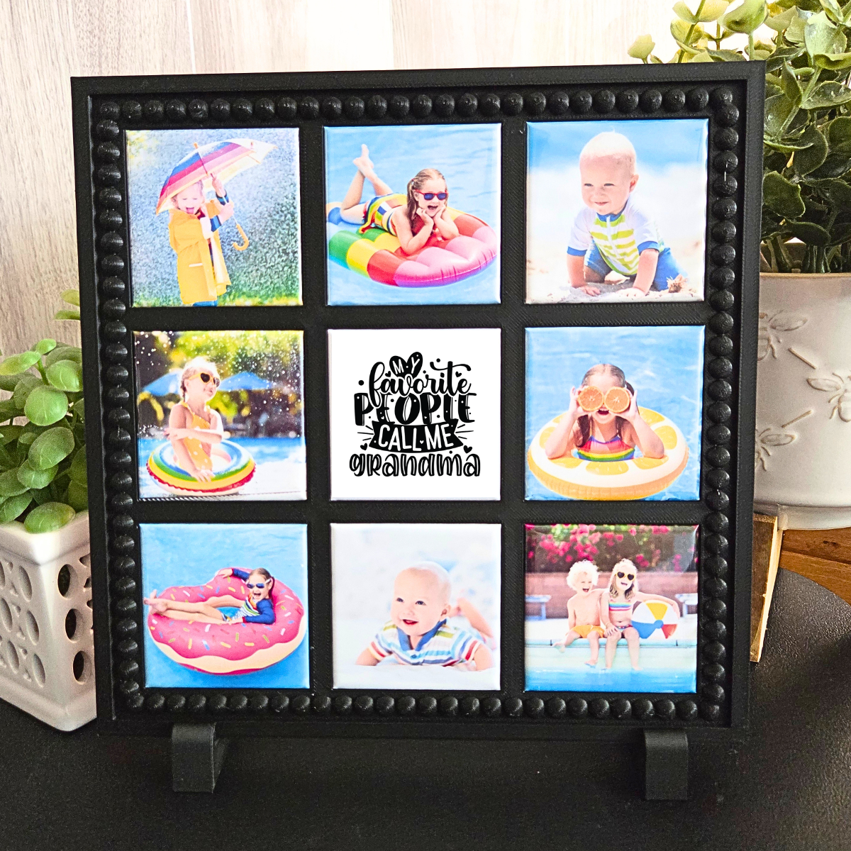 Black photo frame with multiple small photos of children in a pool. for Mother''s Day