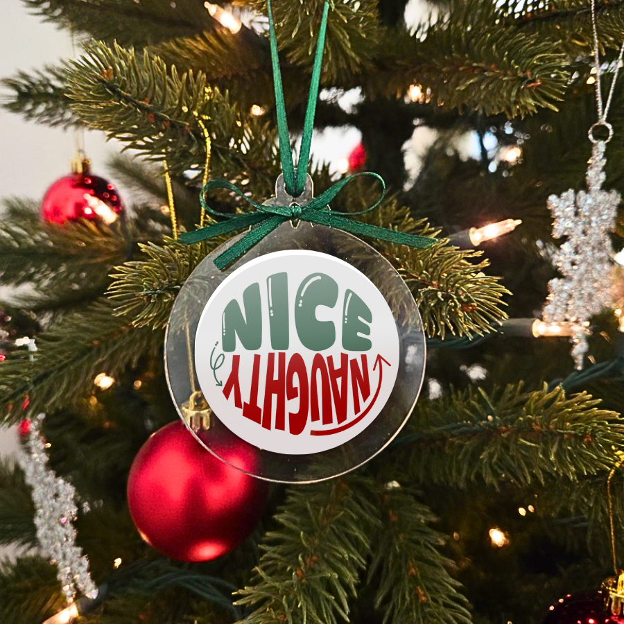 Christmas ornament with 'NICE' and 'NAUGHTY' text on a tree