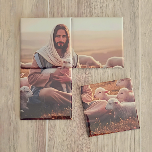 Magnet Puzzle of a Jesus Christ holding a lamb with sheep in the background on a wooden surface. It the Lamb of God puzzle for the Easter season.  show a tag that quotes the Scripture John 10:1 I am the Good Shepherd. The Good Shepherd giveth his life for the sheep.