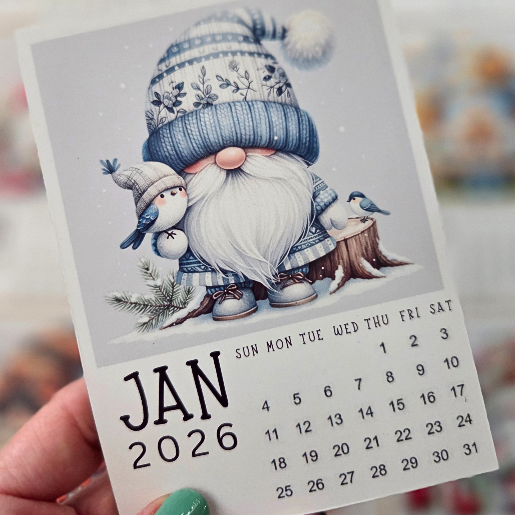 Calendar for January 2026 with a gnome illustration on a light gray background