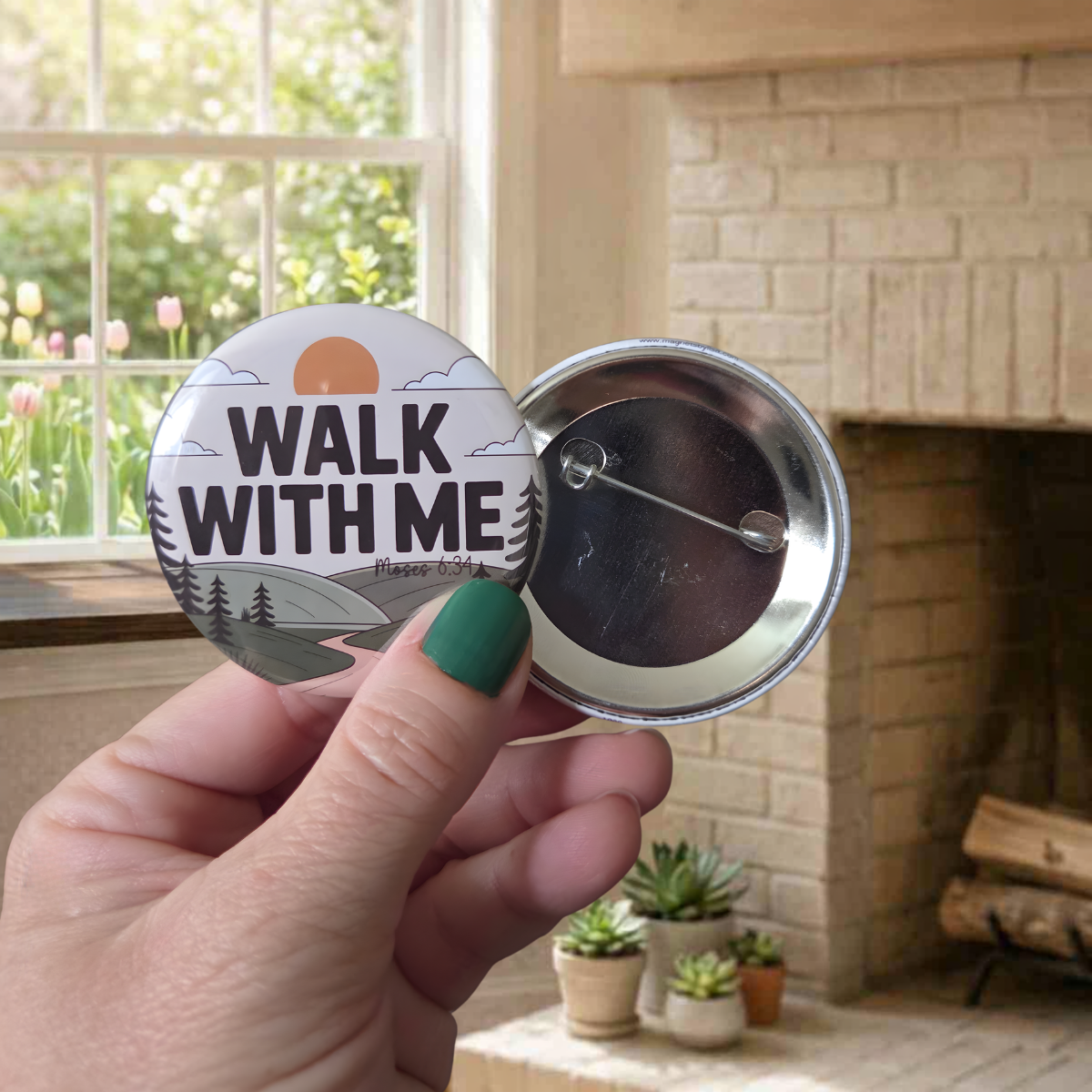 Button badge with 'Walk With Me' text held by a hand in a home setting.