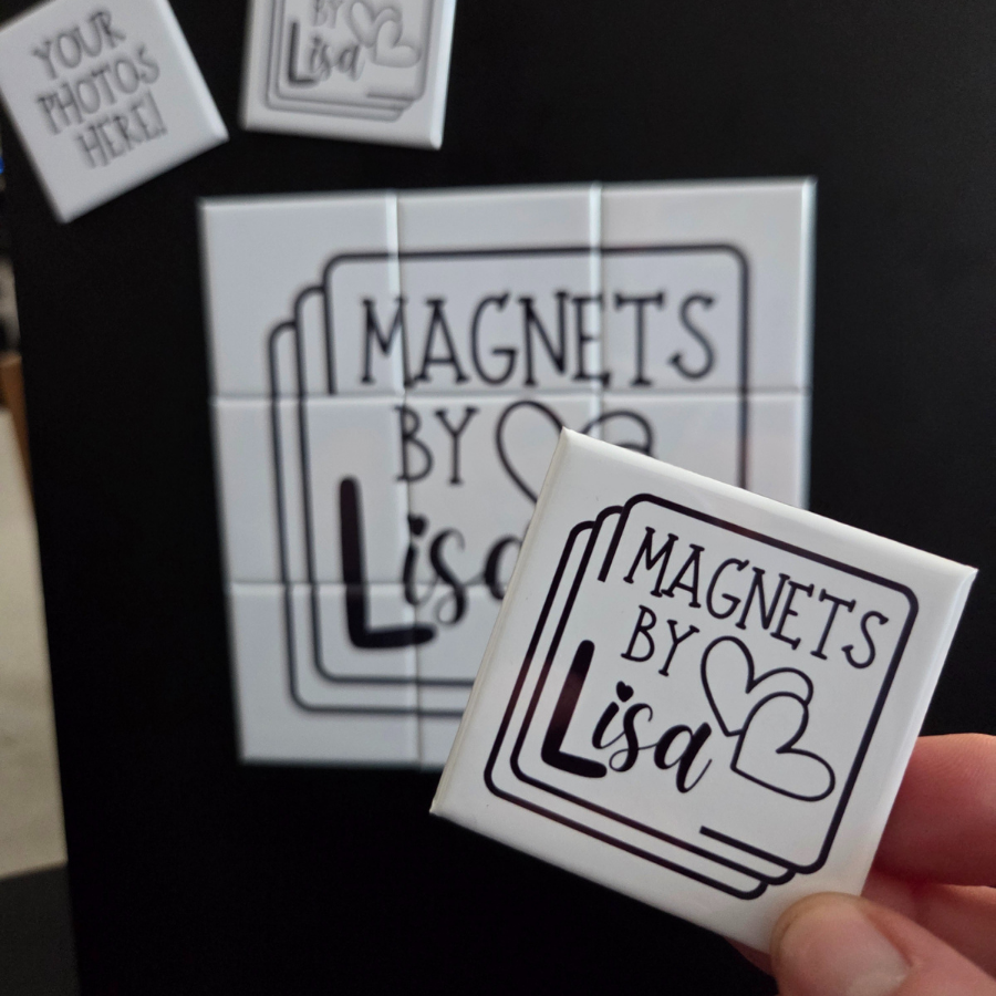 Magnet with 'Magnets by Lisa' text held in front of a display board with the same branding.